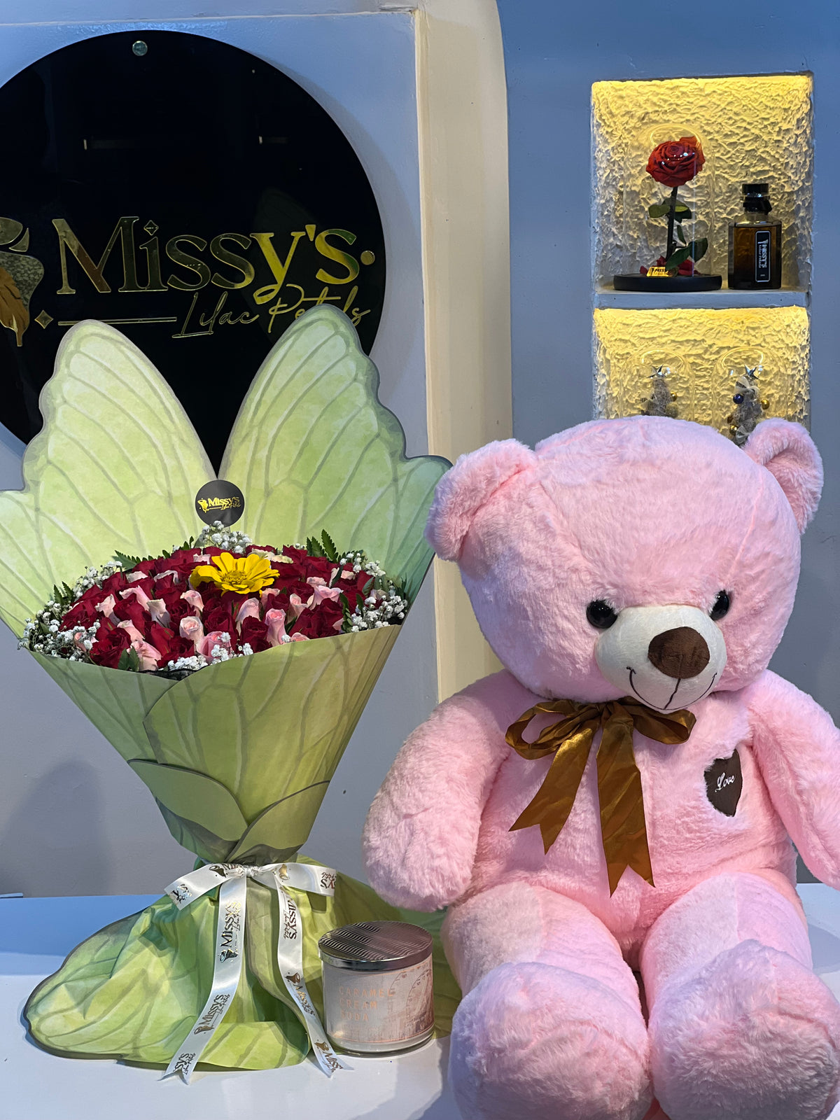 Butterfly bouquet with bear and candle